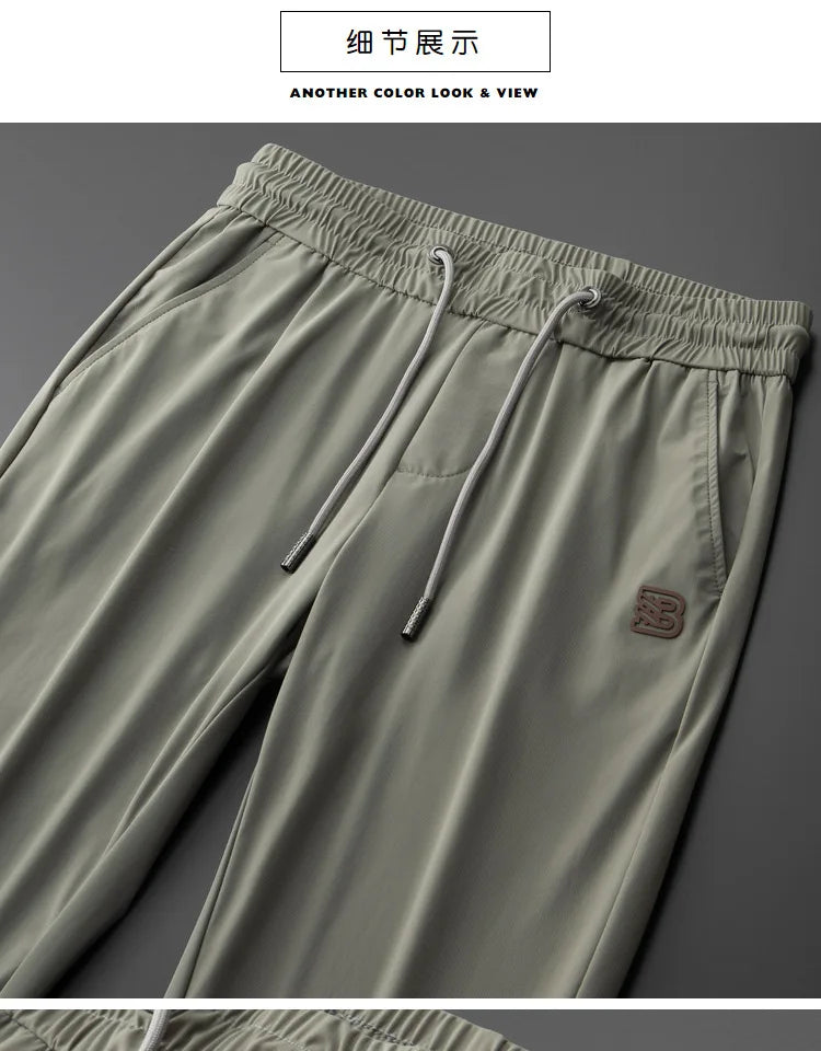 High end brand men's fashionable embroidered casual pants 2024 summer new cool silk breathable luxury solid color sports pants