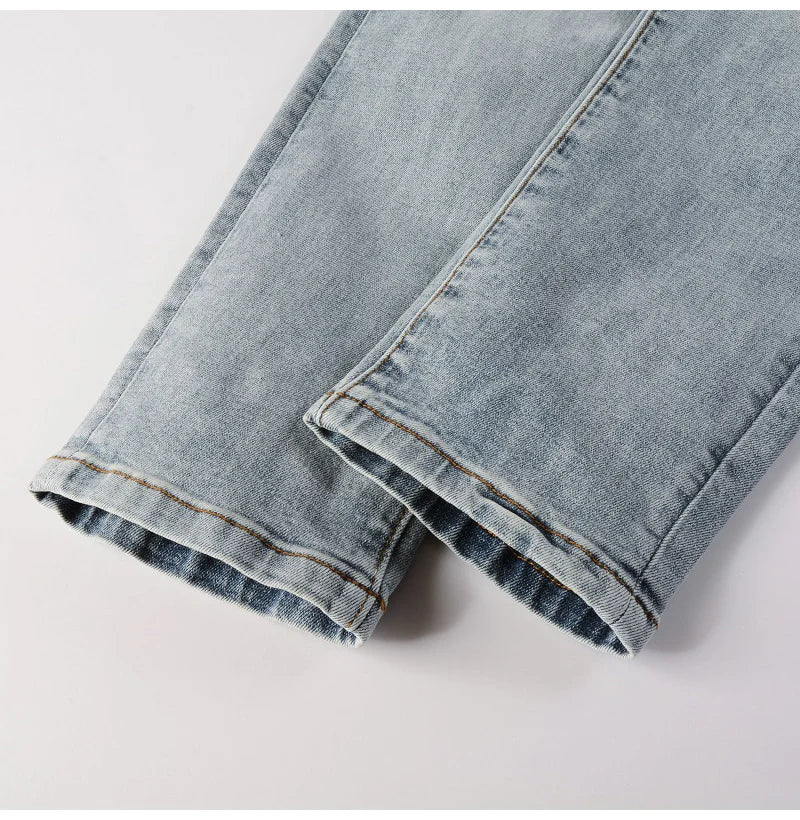 Men Leather Patches Denim Jeans Streetwear Holes Ripped High Stretch Pants Light Blue Skinny Tapered Trousers