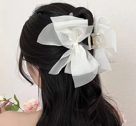 Mesh bow grab clip large hair clip shark clip headpiece on the back of the woman's head