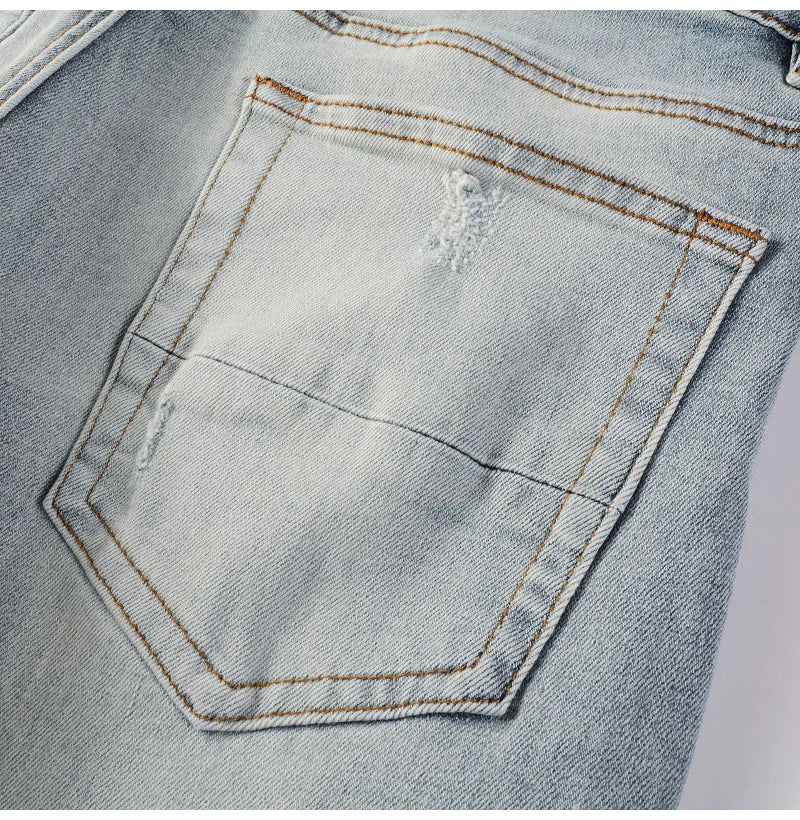 Men Leather Patches Denim Jeans Streetwear Holes Ripped High Stretch Pants Light Blue Skinny Tapered Trousers