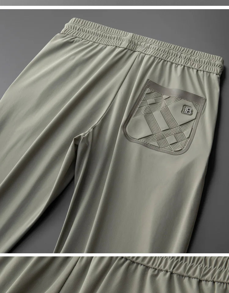 High end brand men's fashionable embroidered casual pants 2024 summer new cool silk breathable luxury solid color sports pants