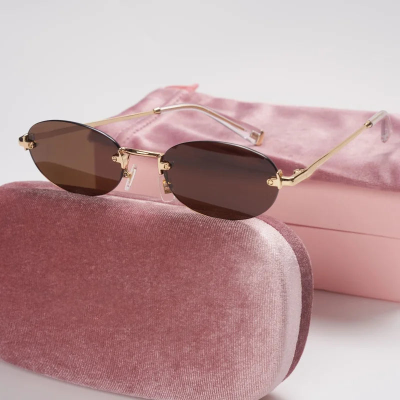 New frameless oval women's small glasses sunglasses brand designer fashionable luxury girls travel driving party sunglasses